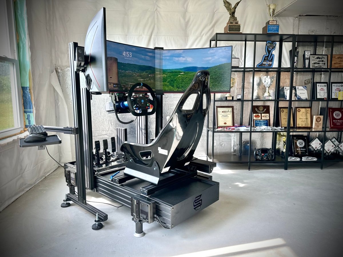 Turn-key SBR165 sim rig with triple screens, hydraulic pedals, and D-BOX motion